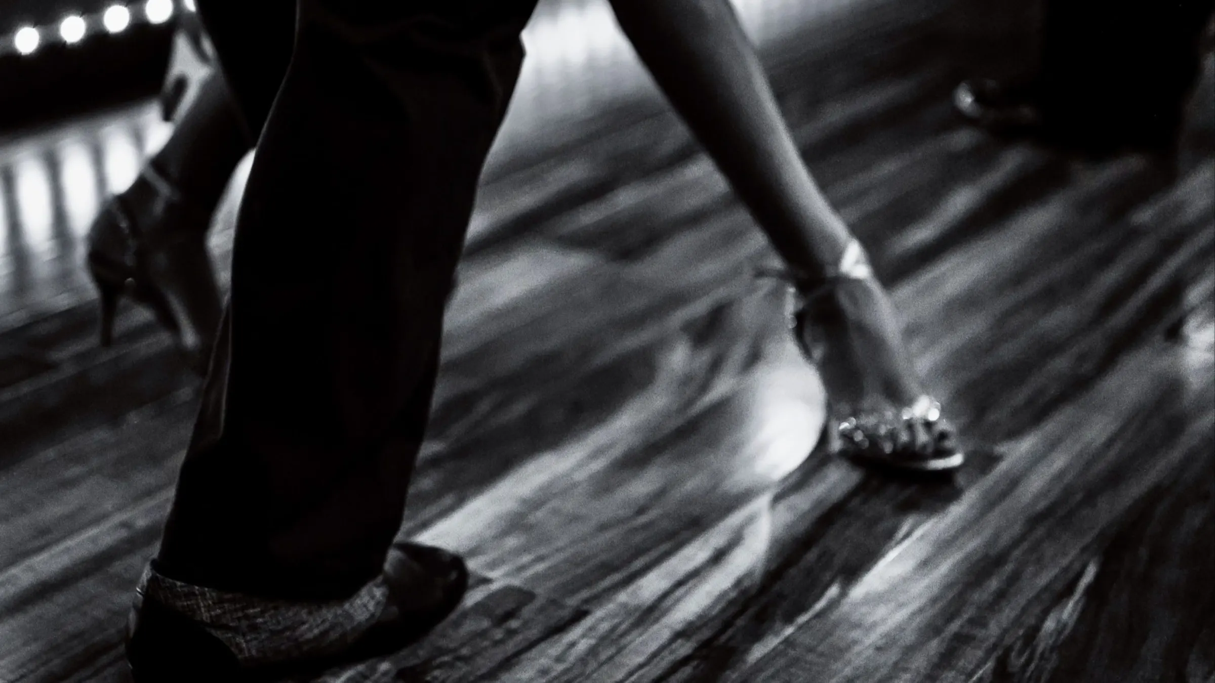 Tango dancer pivoting in heels